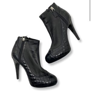 CHANEL black leather quilted logo high heel ankle booties